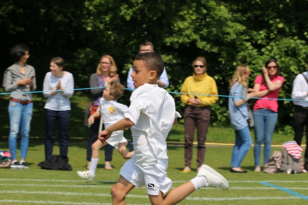 children running over the field