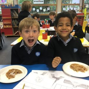 students eating pancakes