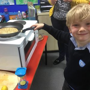 student making a pancake