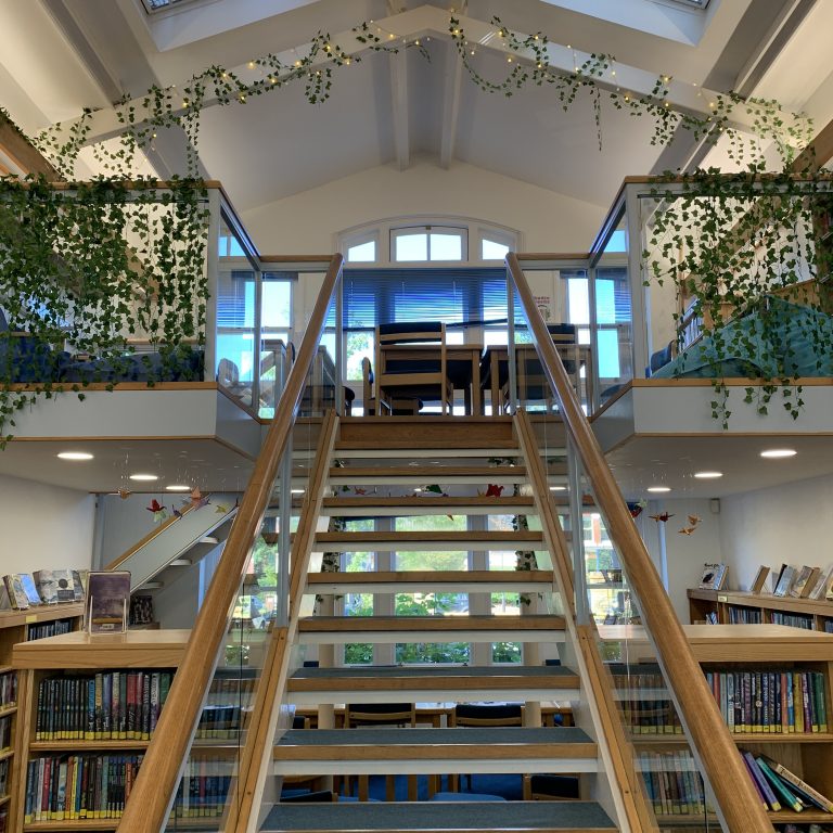 steps leading to the top floor of the library